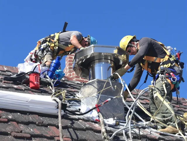 Protective chimney cap installed by Norton Chimney Sweep in Norton, OH